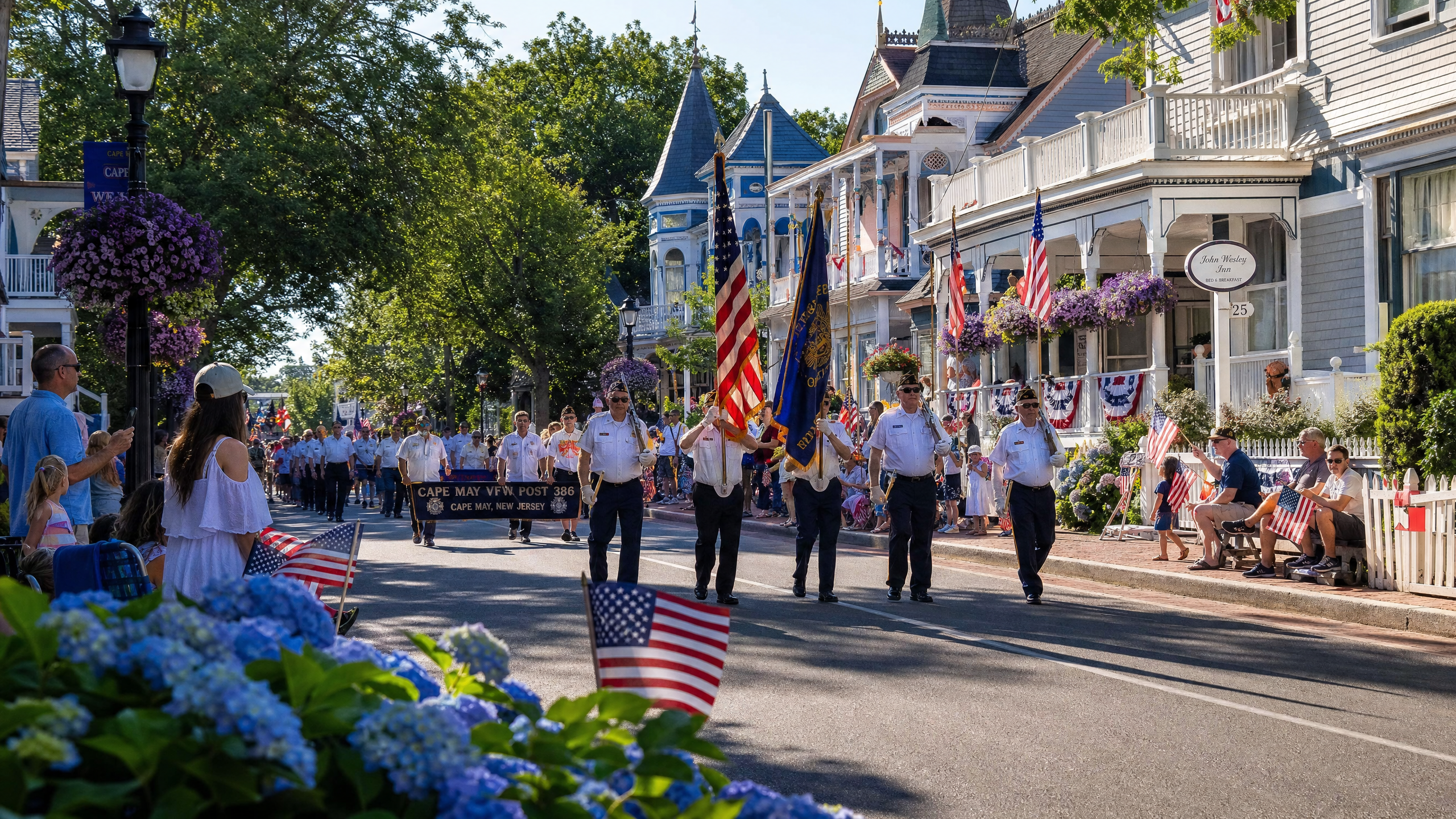 Cape May Memorial Day Parade with VFW Post 386 marching past Victorian homes and hydrangeas