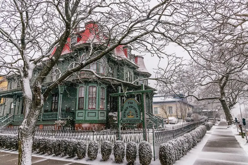 Victorian homes in Cape May covered in winter snow