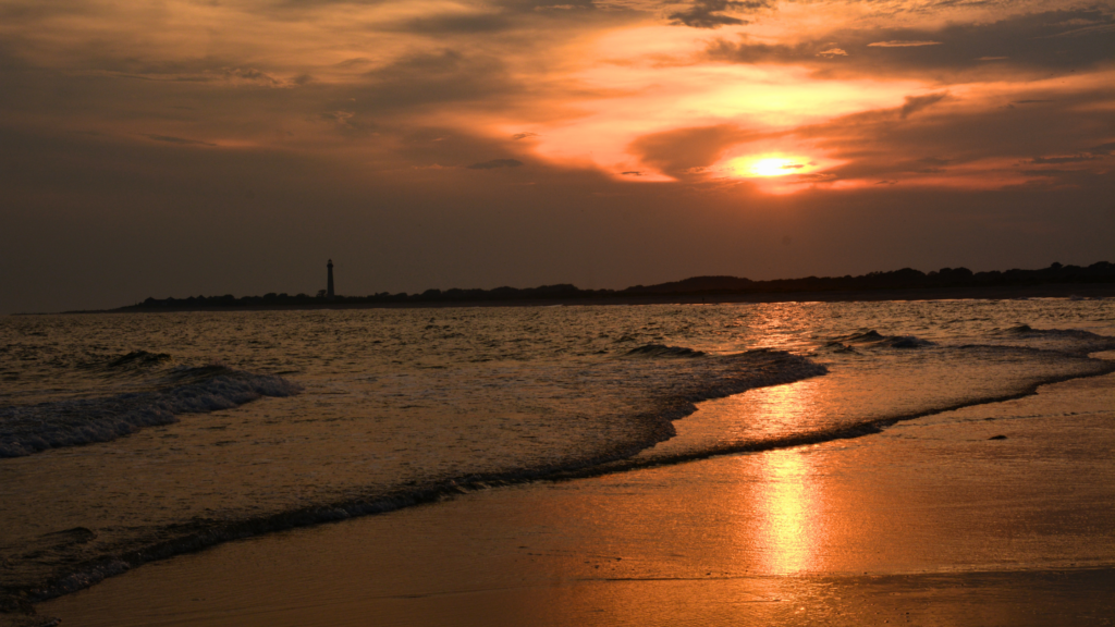 Stunning winter sunset over Delaware Bay at Cape May Sunset Beach